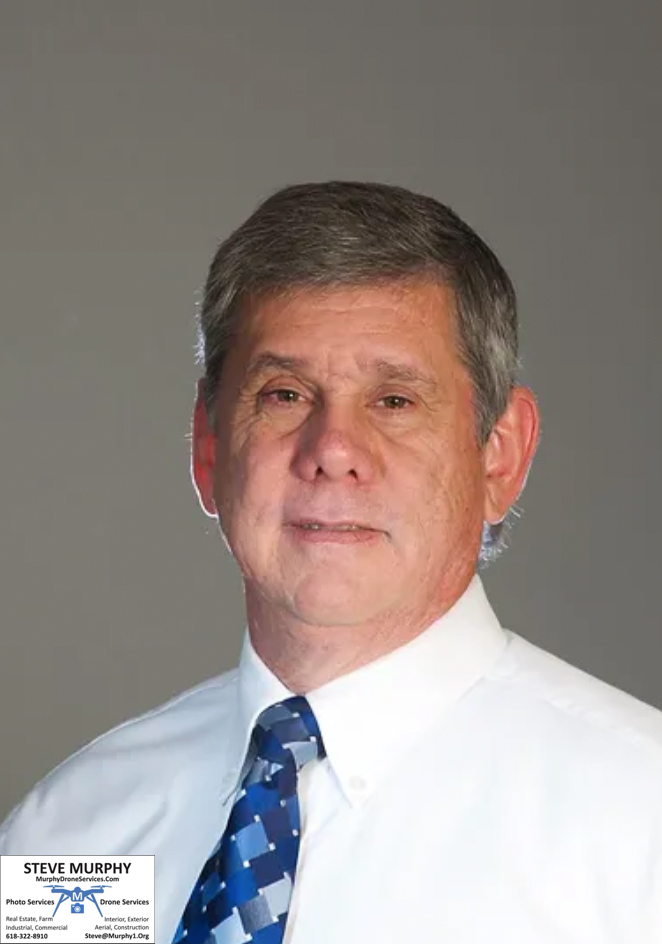 Headshot photo of a male model